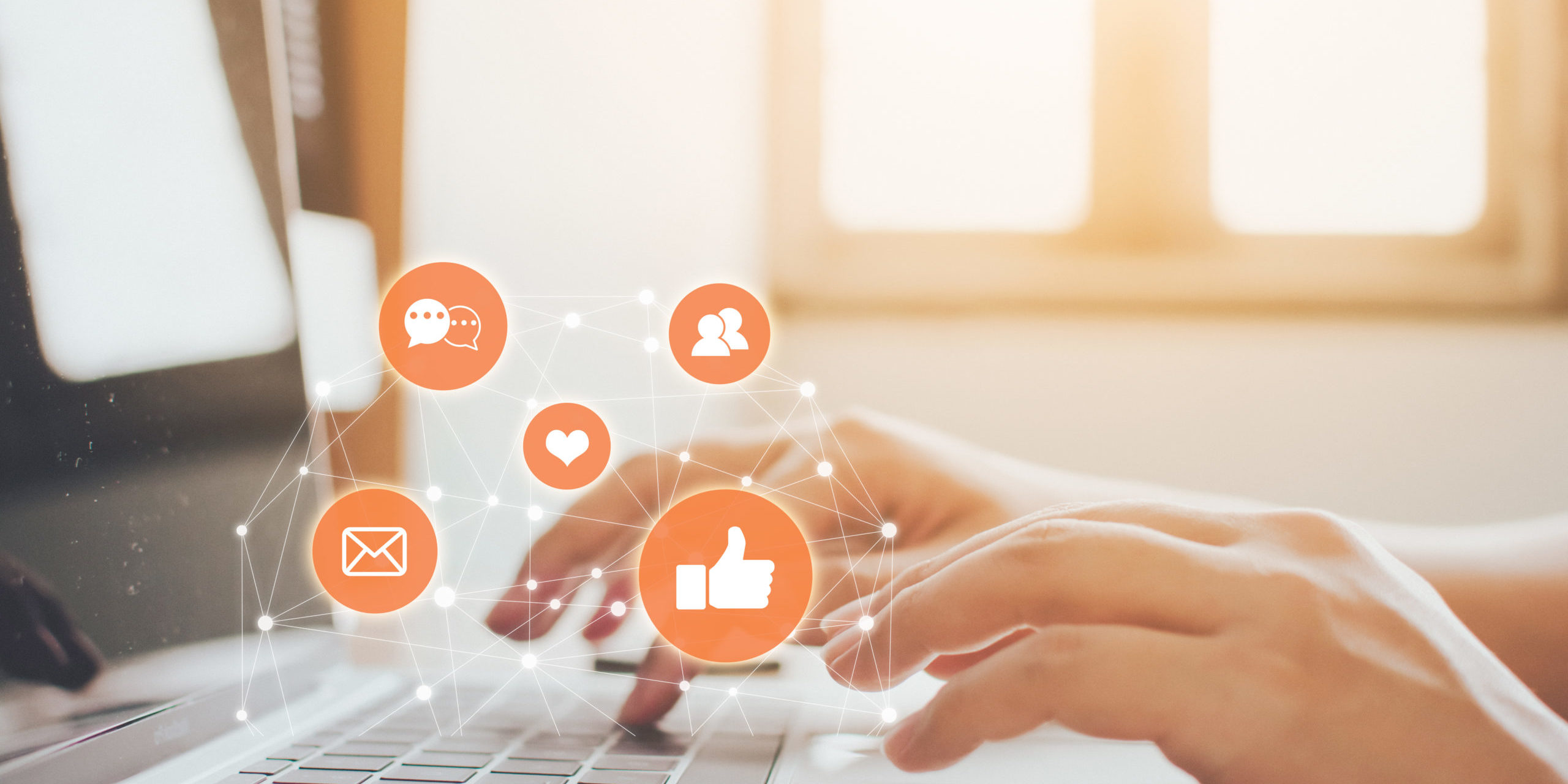 Hand of businessman using laptop with icon social media and social network. Online marketing concept